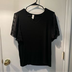 NWOT Black top with mesh dotted sleeves